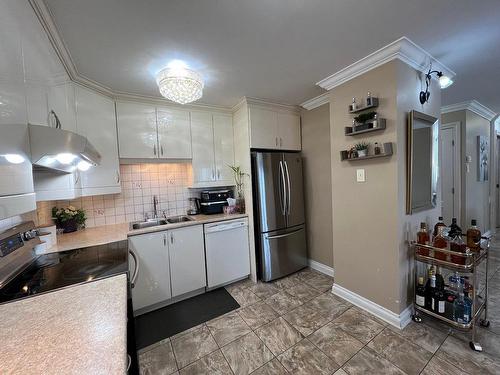 Kitchen - 1214-2555 Av. Du Havre-Des-Îles, Laval (Chomedey), QC - Indoor Photo Showing Kitchen With Double Sink