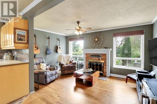 6432 St Louis Drive, Ottawa, ON - Indoor Photo Showing Living Room With Fireplace