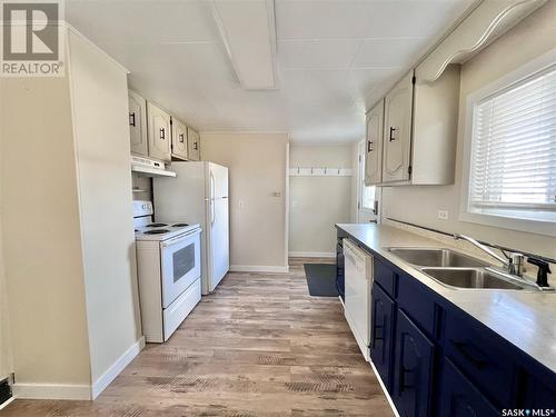 215 Simpson Street, Outlook, SK - Indoor Photo Showing Kitchen With Double Sink