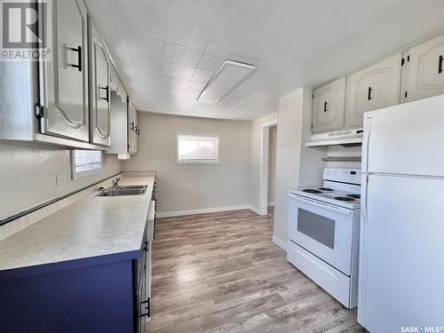 215 Simpson Street, Outlook, SK - Indoor Photo Showing Kitchen With Double Sink