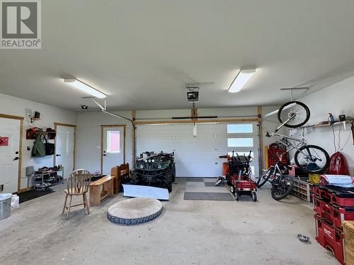 5070 Kinncum Place, 108 Mile Ranch, BC - Indoor Photo Showing Garage