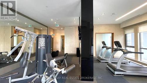 102 - 15 Zorra Street, Toronto (Islington-City Centre West), ON - Indoor Photo Showing Gym Room