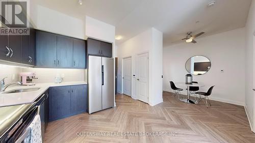 102 - 15 Zorra Street, Toronto (Islington-City Centre West), ON - Indoor Photo Showing Kitchen With Stainless Steel Kitchen