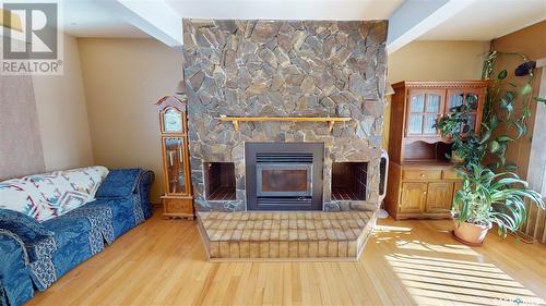 749 Gibson Road, Balgonie, SK - Indoor Photo Showing Living Room With Fireplace