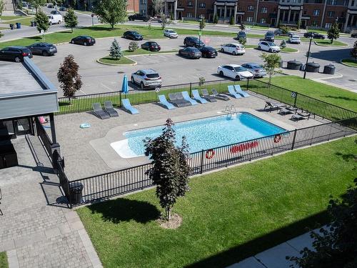 View - 307-959 Rue Jules-Huot, Laval (Chomedey), QC - Outdoor With In Ground Pool