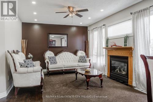 1634 Chelton Place, London, ON - Indoor Photo Showing Living Room With Fireplace