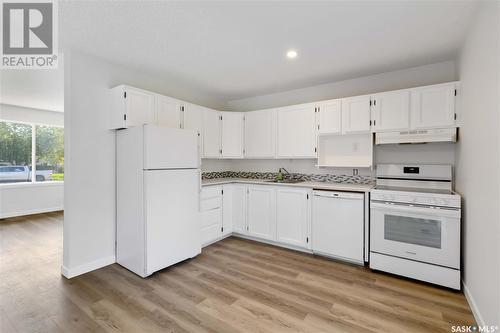 351/353 Russell Road, Saskatoon, SK - Indoor Photo Showing Kitchen