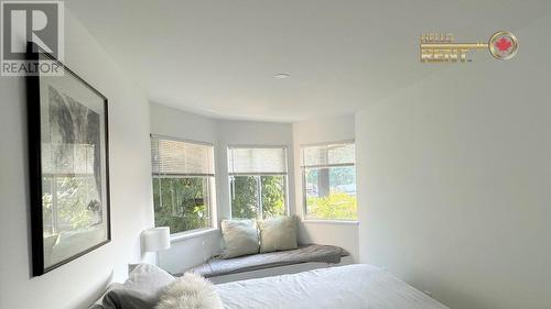 209 809 W 16Th Street, North Vancouver, BC - Indoor Photo Showing Bedroom