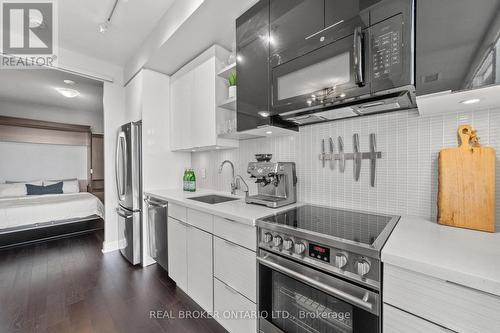 1611 - 33 Shore Breeze Drive, Toronto (Mimico), ON - Indoor Photo Showing Kitchen With Stainless Steel Kitchen