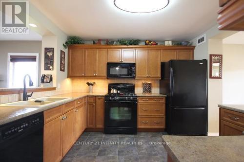 497 Fiddle Park Lane, Shelburne, ON - Indoor Photo Showing Kitchen With Double Sink