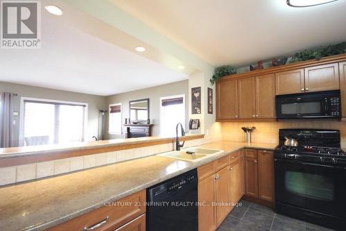 497 Fiddle Park Lane, Shelburne, ON - Indoor Photo Showing Kitchen With Double Sink