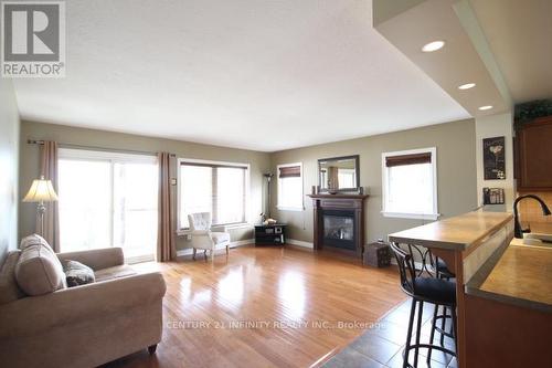 497 Fiddle Park Lane, Shelburne, ON - Indoor Photo Showing Living Room With Fireplace