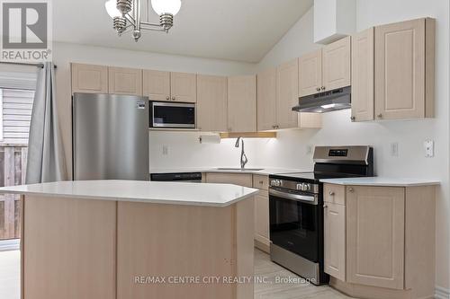 Stunning Kitchen/Quartz Counters/Breakfast Bar - 223 Crimson Crescent, London, ON - Indoor Photo Showing Kitchen