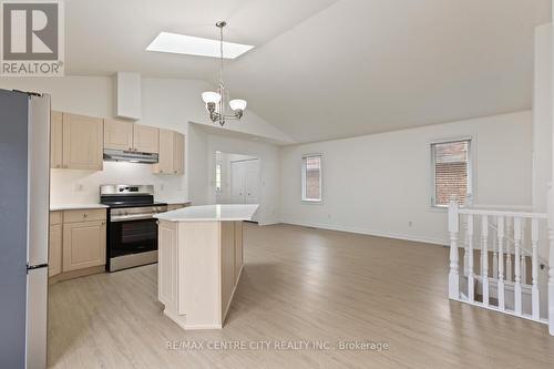 Open Concept Main Floor With Vaulted Ceiling - 223 Crimson Crescent, London, ON - Indoor Photo Showing Kitchen