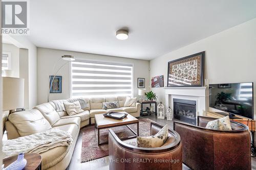 3283 Charles Fay Passage, Oakville, ON - Indoor Photo Showing Living Room With Fireplace