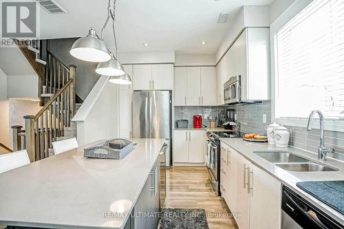 129 Stanley Greene Boulevard, Toronto (Downsview-Roding-Cfb), ON - Indoor Photo Showing Kitchen With Double Sink