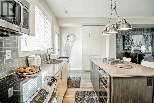 129 Stanley Greene Boulevard, Toronto (Downsview-Roding-Cfb), ON - Indoor Photo Showing Kitchen With Double Sink With Upgraded Kitchen