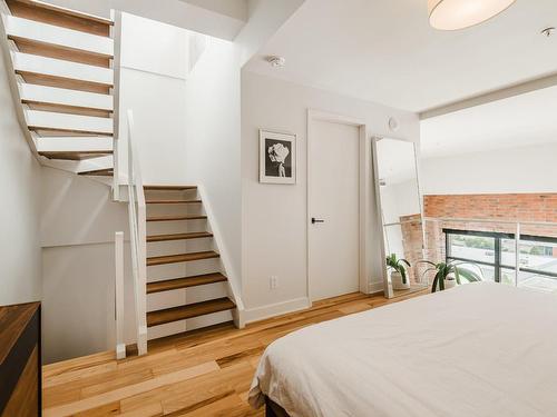 Staircase - 827-1730 Rue St-Patrick, Montréal (Le Sud-Ouest), QC - Indoor Photo Showing Bedroom