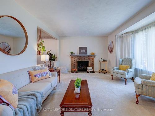 322 Cochrane St, Whitby, ON - Indoor Photo Showing Living Room With Fireplace