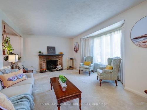 322 Cochrane St, Whitby, ON - Indoor Photo Showing Living Room With Fireplace