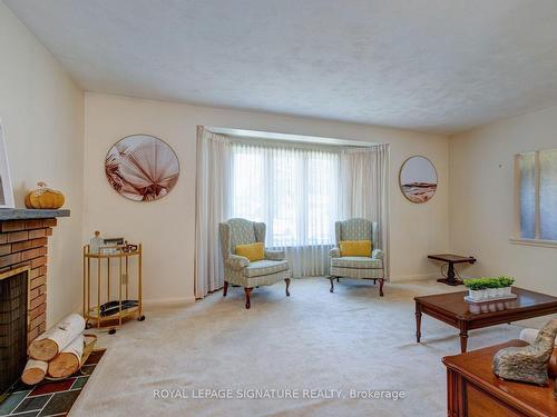 322 Cochrane St, Whitby, ON - Indoor Photo Showing Living Room With Fireplace