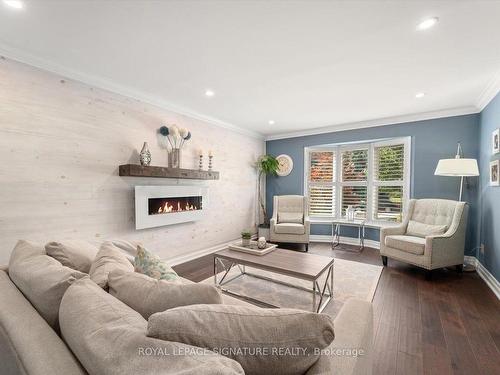 6 Mapleglen Crt, Whitby, ON - Indoor Photo Showing Living Room With Fireplace