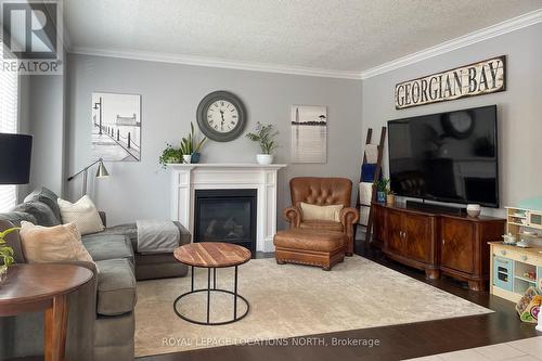 29 Garbutt Crescent, Collingwood, ON - Indoor Photo Showing Living Room With Fireplace