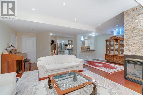 5392 Vail Court, Mississauga, ON - Indoor Photo Showing Living Room With Fireplace