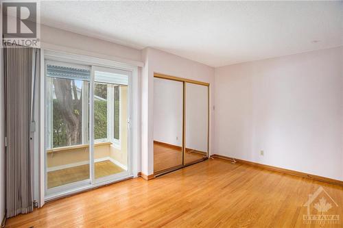 Primary bedroom features sunny south facing solarium - 1056 Harkness Avenue, Ottawa, ON - Indoor Photo Showing Other Room