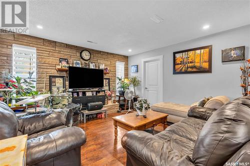 37 Ponderosa Trail N, Swift Current, SK - Indoor Photo Showing Living Room With Fireplace