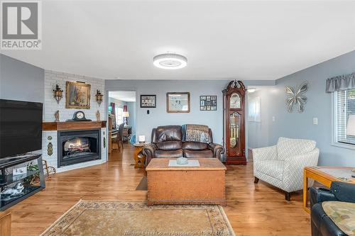 24 Robin Crescent, Lakeshore, ON - Indoor Photo Showing Living Room With Fireplace