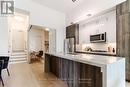 307 - 14 Dewhurst Boulevard, Toronto (Danforth), ON  - Indoor Photo Showing Kitchen With Upgraded Kitchen 