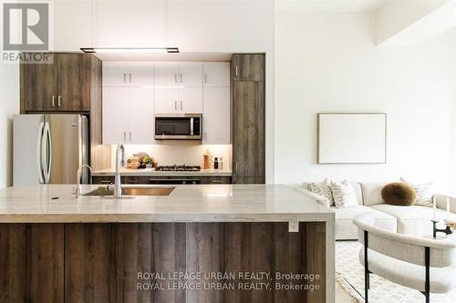 307 - 14 Dewhurst Boulevard, Toronto (Danforth), ON - Indoor Photo Showing Kitchen With Double Sink With Upgraded Kitchen