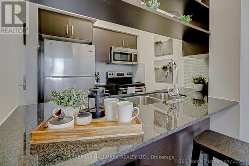 Ph02 - 30 Herons Hill Way, Toronto (Henry Farm), ON - Indoor Photo Showing Kitchen With Stainless Steel Kitchen With Double Sink With Upgraded Kitchen