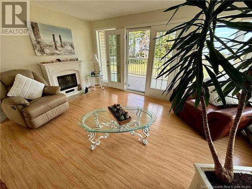 1975 Queen Elizabeth Drive, Bathurst, NB - Indoor Photo Showing Living Room With Fireplace