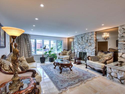 Salon - 19 Rue St-Judes, Laval (Chomedey), QC - Indoor Photo Showing Living Room With Fireplace