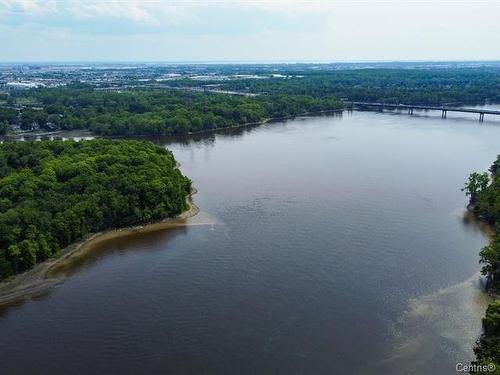 Bord de l'eau - 19 Rue St-Judes, Laval (Chomedey), QC - Outdoor With Body Of Water With View