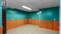 Basement is all drywalled with Wainscotting. - 