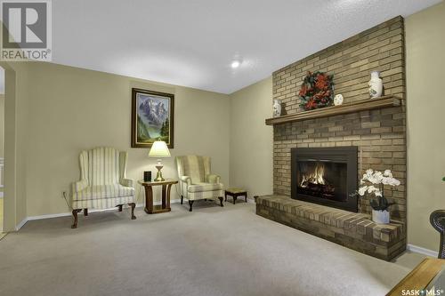 3731 Wetmore Crescent, Regina, SK - Indoor Photo Showing Living Room With Fireplace