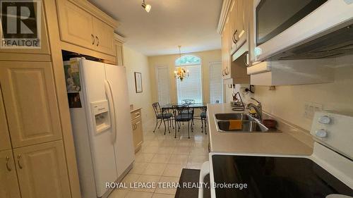 13 - 13 Montebello Terrace, New Tecumseth, ON - Indoor Photo Showing Kitchen With Double Sink