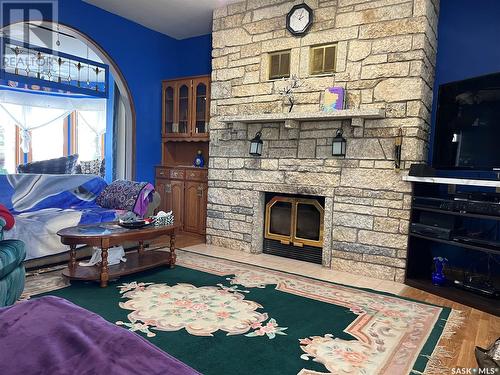 Castle Lane Acres, Willowdale Rm No. 153, SK - Indoor Photo Showing Living Room With Fireplace