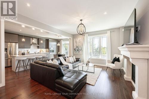 7 Turner Drive, New Tecumseth (Tottenham), ON - Indoor Photo Showing Living Room With Fireplace