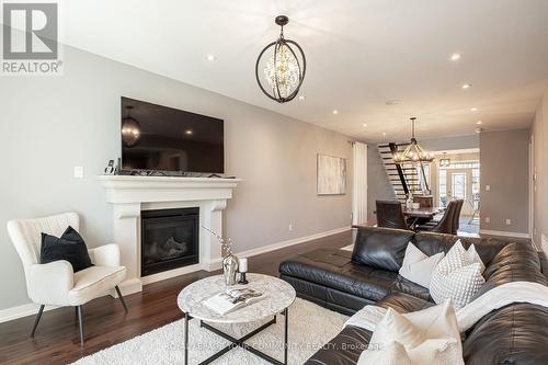 7 Turner Drive, New Tecumseth (Tottenham), ON - Indoor Photo Showing Living Room With Fireplace