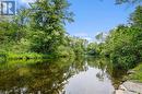 Swimming and paddling right across the road - 313 Noonan Side Road, Perth, ON  - Outdoor With Body Of Water With View 