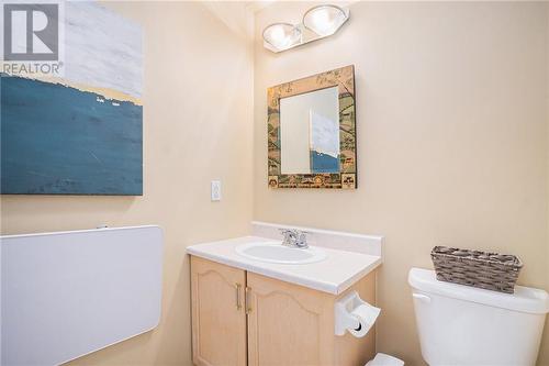 Powder room with laundry - 313 Noonan Side Road, Perth, ON - Indoor Photo Showing Bathroom