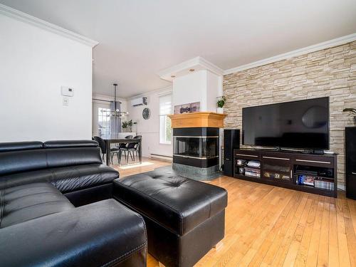 Living room - 253 Av. Du Plateau, Donnacona, QC - Indoor Photo Showing Living Room With Fireplace