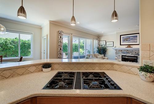 211-665 Cook Road, Kelowna, BC - Indoor Photo Showing Kitchen With Fireplace