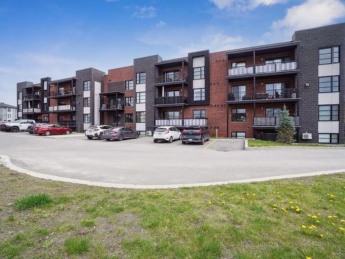 Face arriÃ¨re - 402-2300 Rue De La Traversée, Saint-Jérôme, QC - Outdoor With Facade