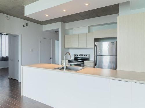 Kitchen - 405-9825 Boul. Leduc, Brossard, QC - Indoor Photo Showing Kitchen With Upgraded Kitchen