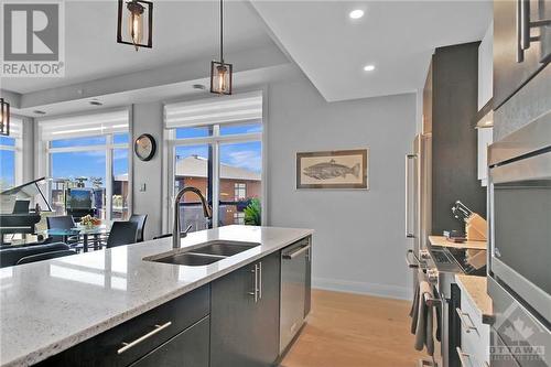 101 Cortile Private Unit#402, Ottawa, ON - Indoor Photo Showing Kitchen With Double Sink